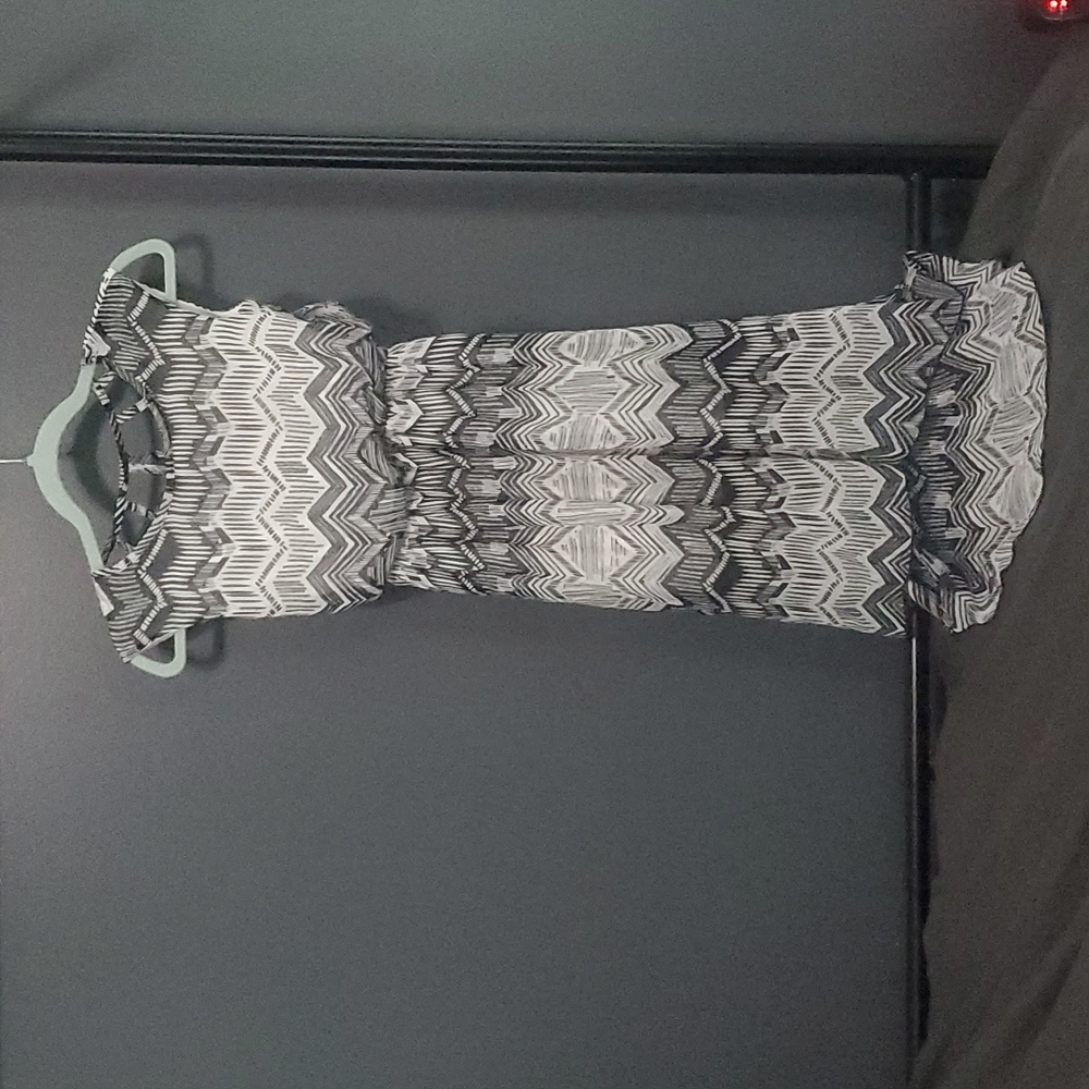 Lots of Love hi-low tribal print dress w/cut out on the back. Never worn. Size 8